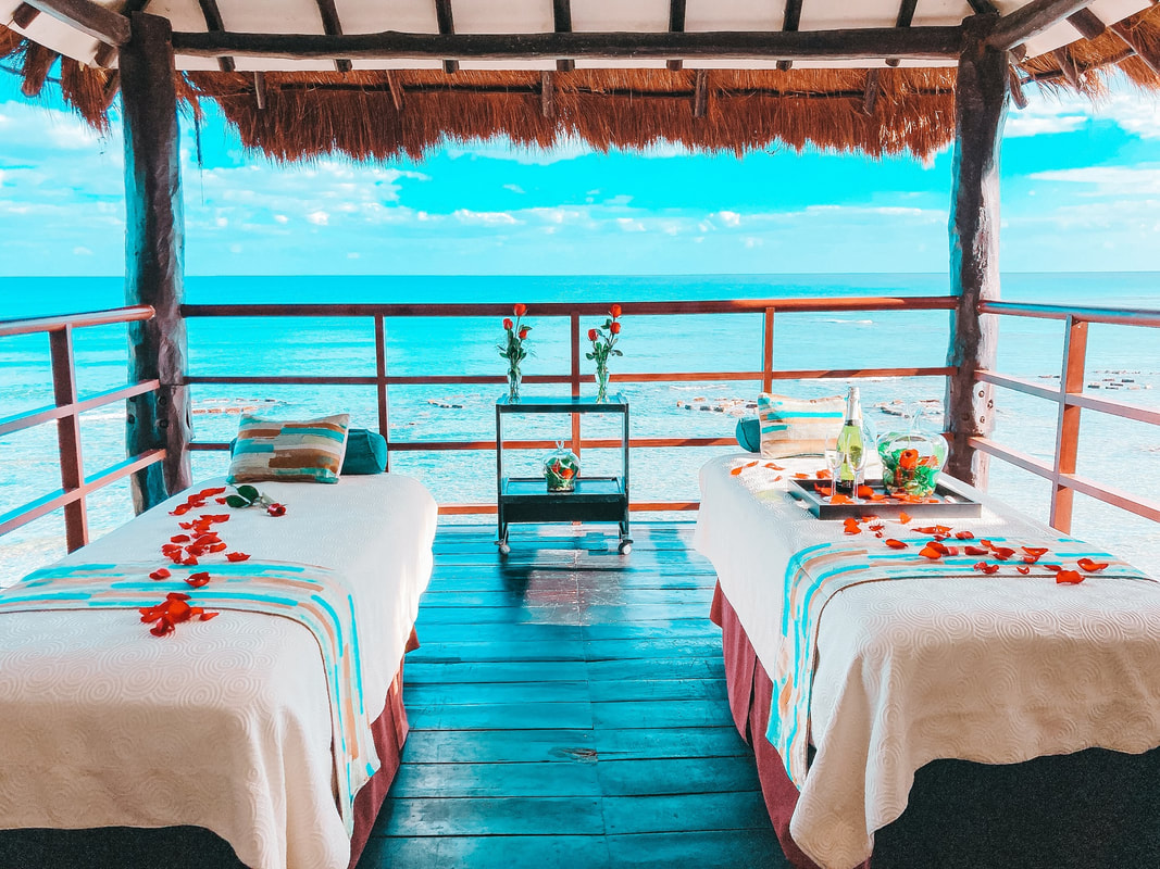 couples massage by the Caribbean Ocean